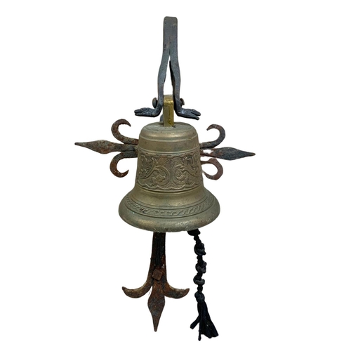 28 - Victorian brass and iron wall hanging bell. 30 x 48cm