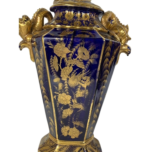 3 - Pair of large Victorian colt blue and gilt urns. With Chinese dragon design. 37 x 55cm