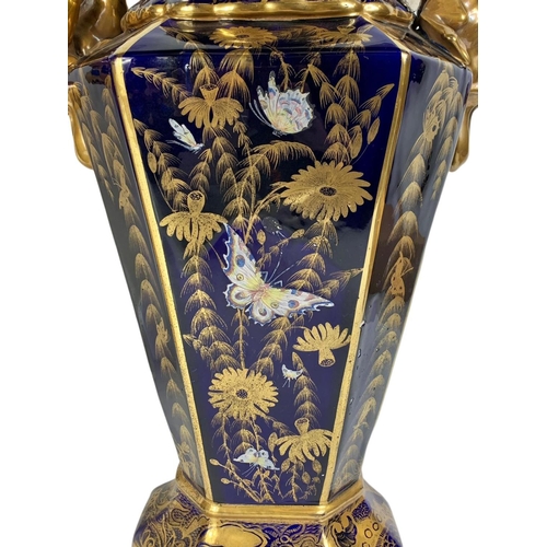 3 - Pair of large Victorian colt blue and gilt urns. With Chinese dragon design. 37 x 55cm