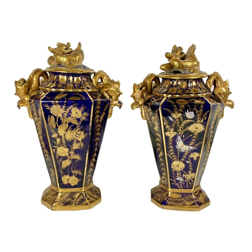 3 - Pair of large Victorian colt blue and gilt urns. With Chinese dragon design. 37 x 55cm