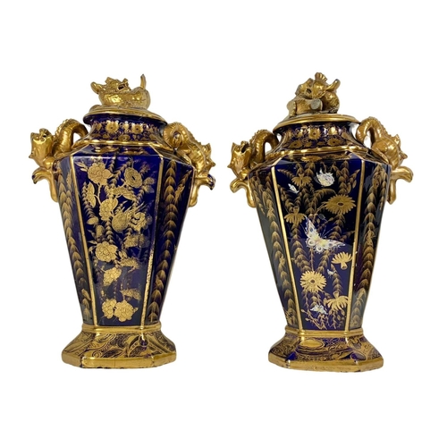 3 - Pair of large Victorian colt blue and gilt urns. With Chinese dragon design. 37 x 55cm