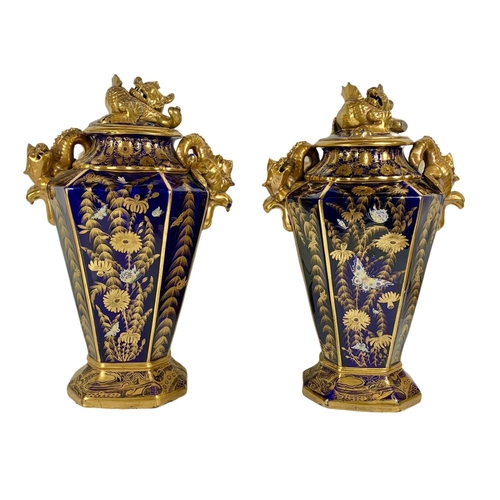 3 - Pair of large Victorian colt blue and gilt urns. With Chinese dragon design. 37 x 55cm