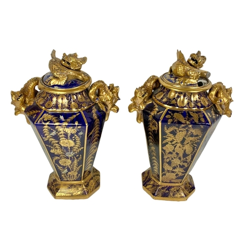 3 - Pair of large Victorian colt blue and gilt urns. With Chinese dragon design. 37 x 55cm