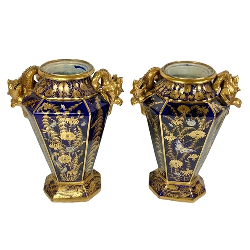 3 - Pair of large Victorian colt blue and gilt urns. With Chinese dragon design. 37 x 55cm