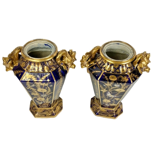 3 - Pair of large Victorian colt blue and gilt urns. With Chinese dragon design. 37 x 55cm