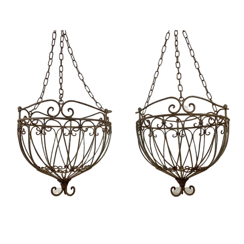 311 - A pair large iron hanging baskets. 37 x 79cm including chain.