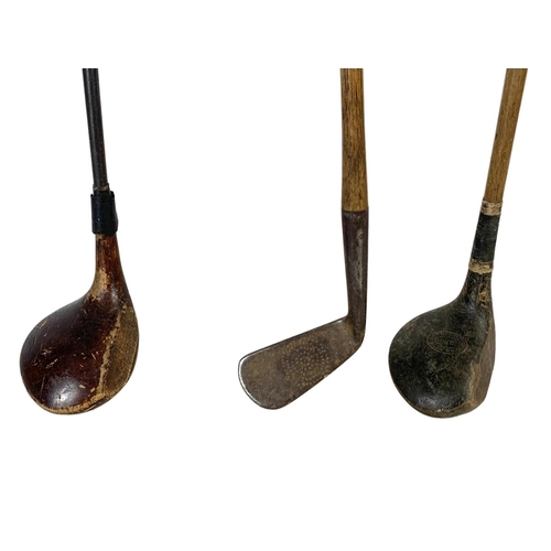 344 - 3 early 20th century golf clubs. 2 Hickory.