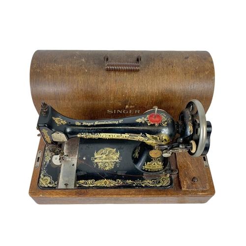 346 - An early 20th century wind up Singer sewing machine 51 x 34cm.