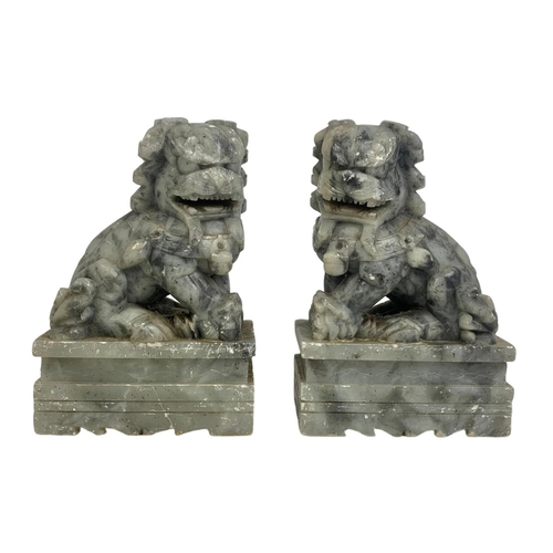 36 - Pair of Chinese alabaster Foo Lions. 11.5 x 18cm.