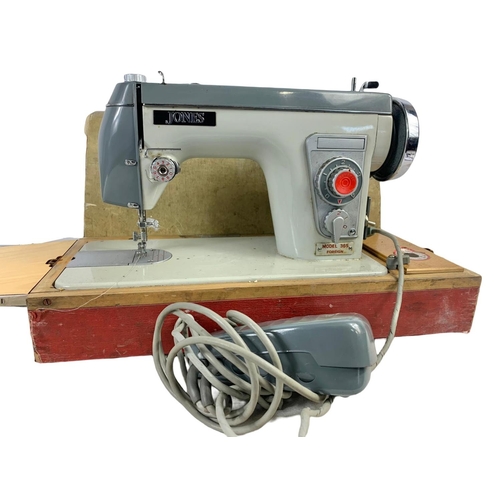 360 - A vintage Jones sewing machine. 49 x 34cm.