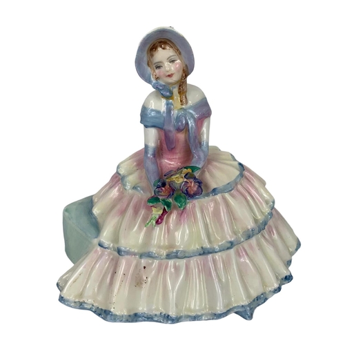 415 - Royal Doulton pottery figurine “Daydreams” and a Coalport pottery figurine. 19.5cm