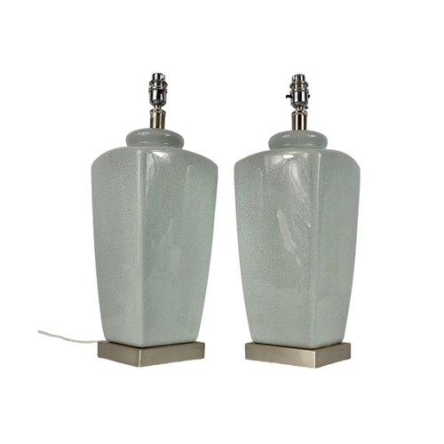 422 - Pair of large pottery lamps. 48cm