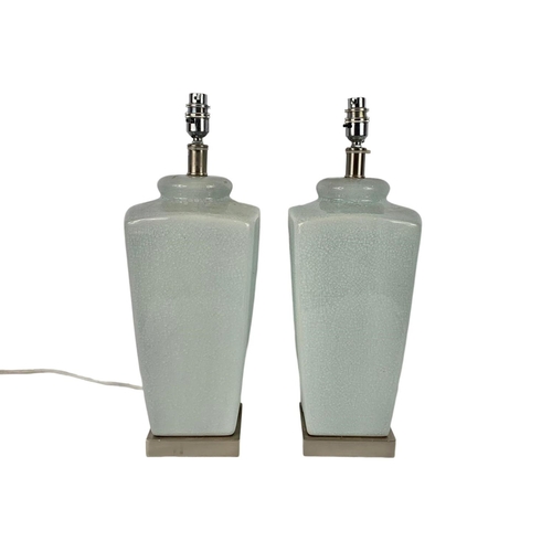 422 - Pair of large pottery lamps. 48cm