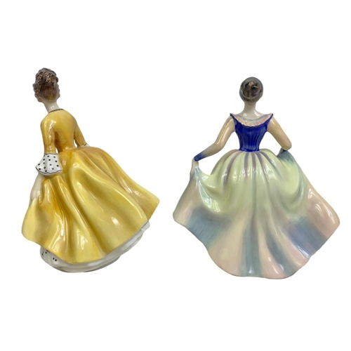 445 - 2 Royal Doulton pottery figurines “Coralie and Lisa” 19cm