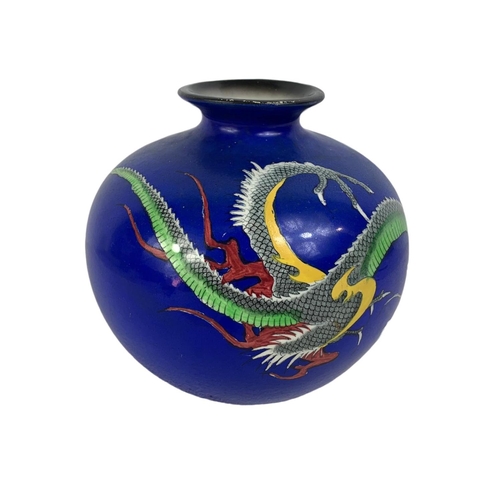 457 - 4 pieces of vintage pottery. Including a blue Chinese design Bisto England vase with hand painted dr... 