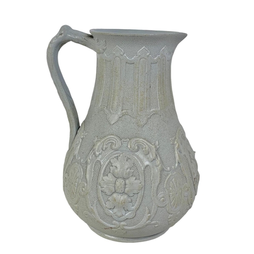 458 - A Victorian “Donatello” smear glazed stoneware jug. Made by William Brownfield & Sons. 1861. 18cm