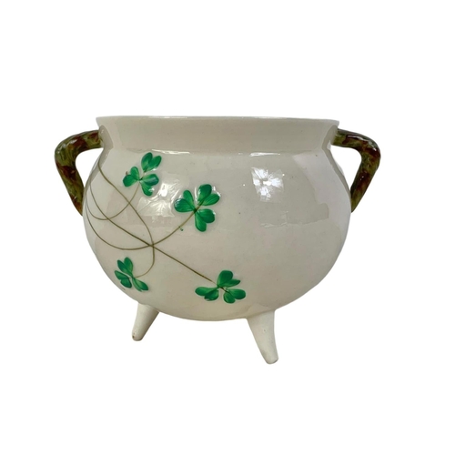 459 - 2nd period Belleek pottery shamrock 3 legged sugar pot. 15 x 10.5cm