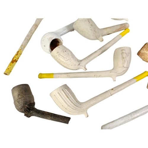 46 - Quantity of vintage clay pipes. Some with Irish harp design.