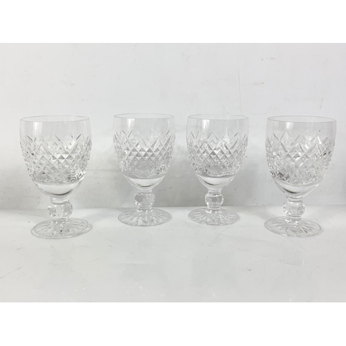 465 - Quantity crystal. Including a set of 4 glasses, a decanter, comport, vase and a clock.