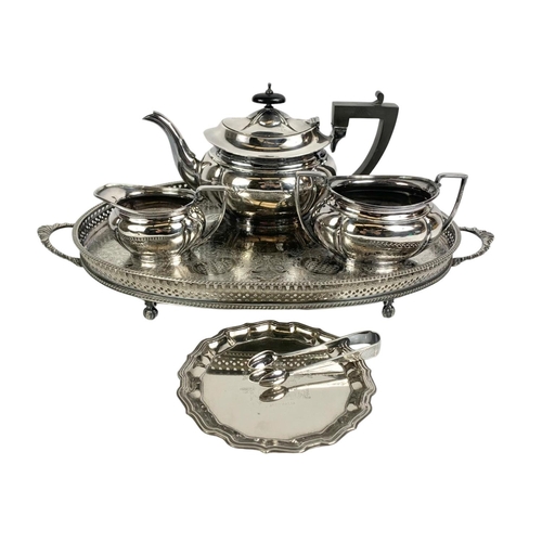 475 - A silver plated tea service. Tray measures 50cm