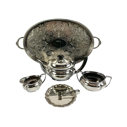 475 - A silver plated tea service. Tray measures 50cm