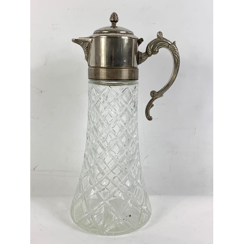 476 - Large vintage silver plated claret jug. 18 x 36cm