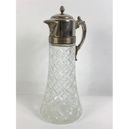 476 - Large vintage silver plated claret jug. 18 x 36cm