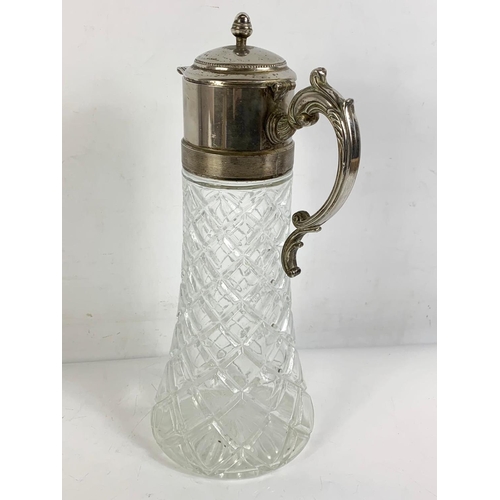 476 - Large vintage silver plated claret jug. 18 x 36cm