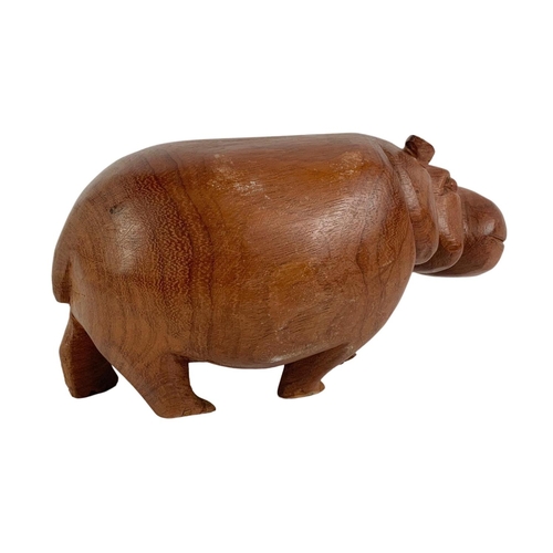 480 - Large African wooden hippo. 27cm