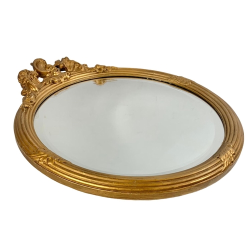 49 - Vintage ornate gilt framed mirror. 40 x 47cm