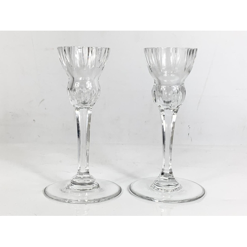 497 - Pair of Waterford crystal candlesticks. 15.5cm