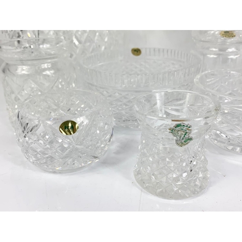 500 - Quantity of crystal. Including a Waterford vase 6cm and mostly Tyrone. Largest bowl 17 x 15cm.