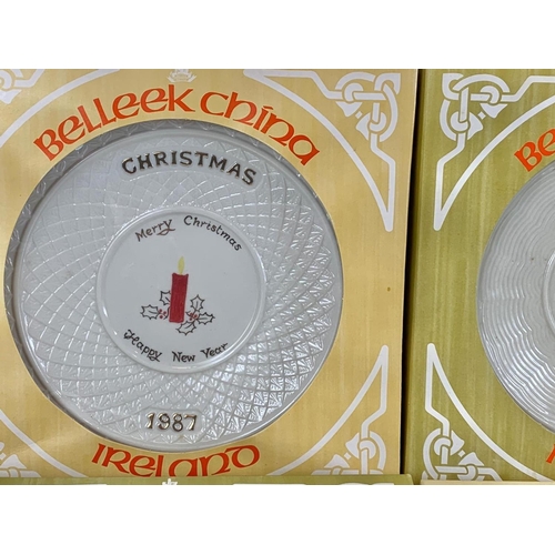 502 - 9 Belleek China Christmas plates in boxes. 1970’s and 80’s. 26cm