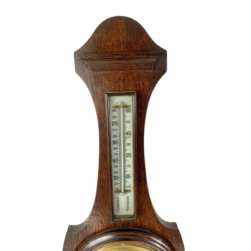 52 - Late Victorian oak cased barometer. Circa 1890. 84cm