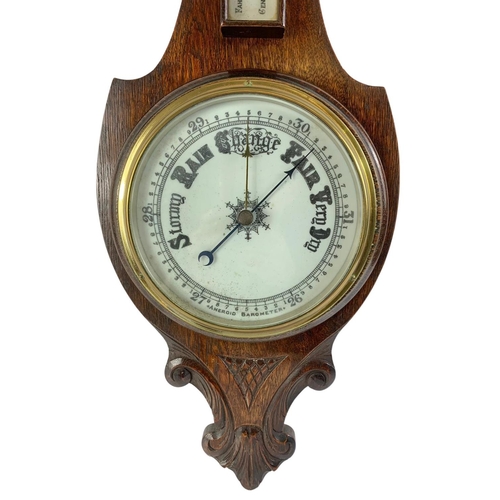 52 - Late Victorian oak cased barometer. Circa 1890. 84cm