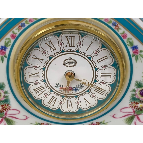 523 - A limited edition Minton Rose china clock. 19 x 12cm