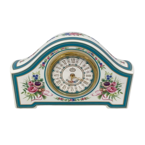 523 - A limited edition Minton Rose china clock. 19 x 12cm