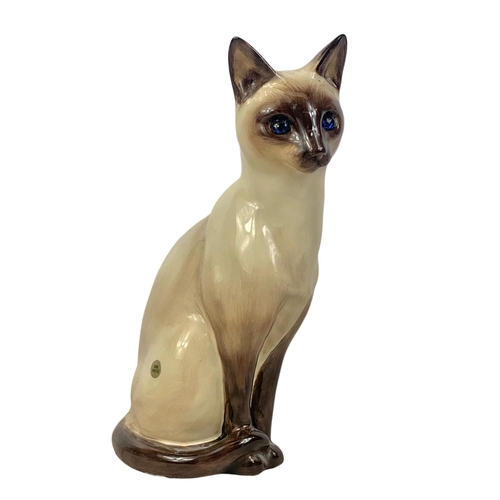 524 - 2 large pottery cats. Just Cats & Co with glass eyes 30.5cm. Melba Ware 38cm