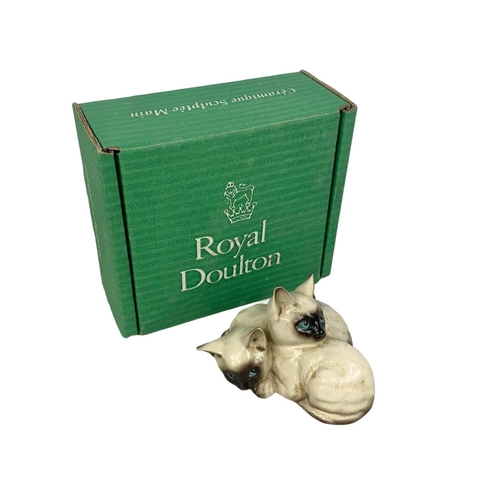 525 - Royal Doulton porcelain cats in box. Number 1296. Cats measure 12cm. Box measures 17 x 15cm