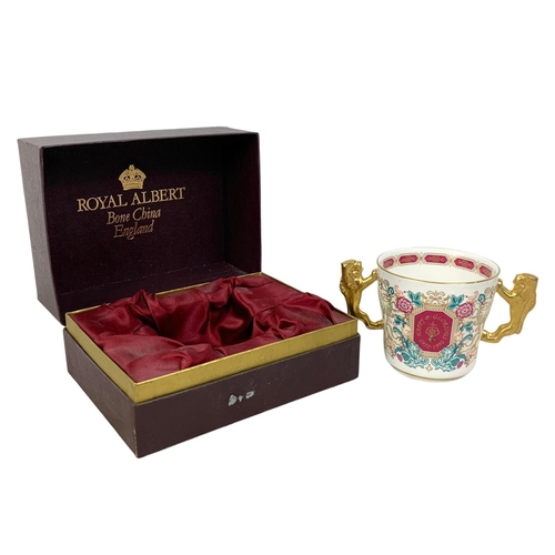 528 - A Limited Edition Royal Albert Paragon cup. To Commemorate the 40th year of the reign of her majesty... 