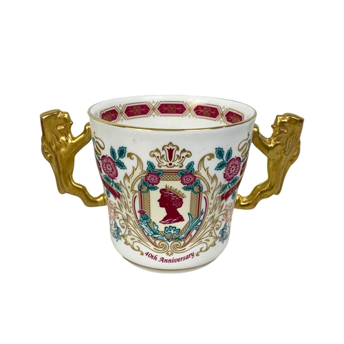 528 - A Limited Edition Royal Albert Paragon cup. To Commemorate the 40th year of the reign of her majesty... 