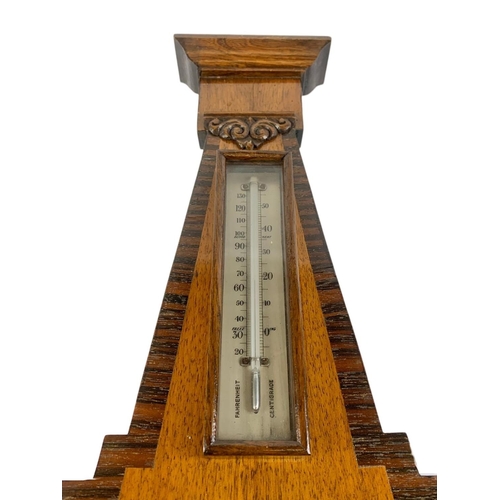 53 - An Edwardian barometer. 23 x 56cm