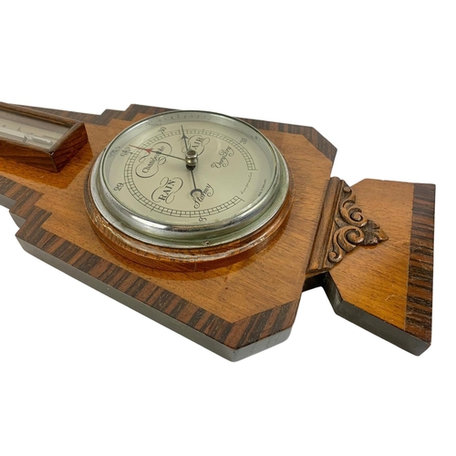 53 - An Edwardian barometer. 23 x 56cm