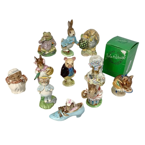 558 - 11 Beswick Beatrix Potter animal figures. 1 box. From 1950’s to 1990’s.