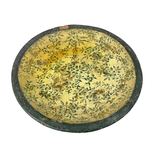 564 - Marble stones on a large decorative terracotta bowl. Bowl measures 41cm