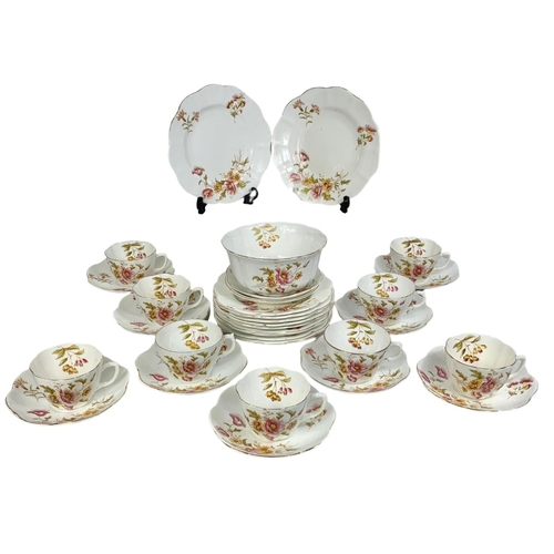 570 - A 31 piece early 20th century “Poppy” pattern tea set by Allertons. Circa 1900/1915.