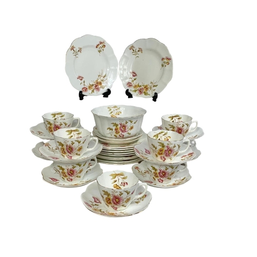 570 - A 31 piece early 20th century “Poppy” pattern tea set by Allertons. Circa 1900/1915.