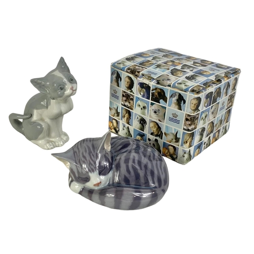 575 - Lladro pottery can and a Royal Copenhagen cat with box. Box measures 15 x 13 x 11cm.