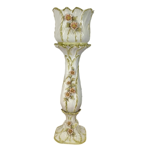 588 - A large Italian pottery jardiniere on stand. 92cm