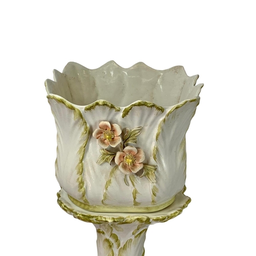 588 - A large Italian pottery jardiniere on stand. 92cm